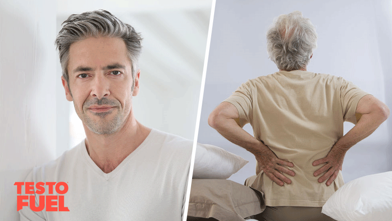 Two older man, one smiling at the camera and the other suffering from back pain