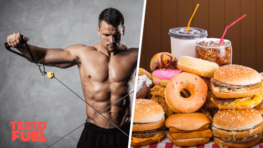 Muscular man lifting weights and a table full of junk foods