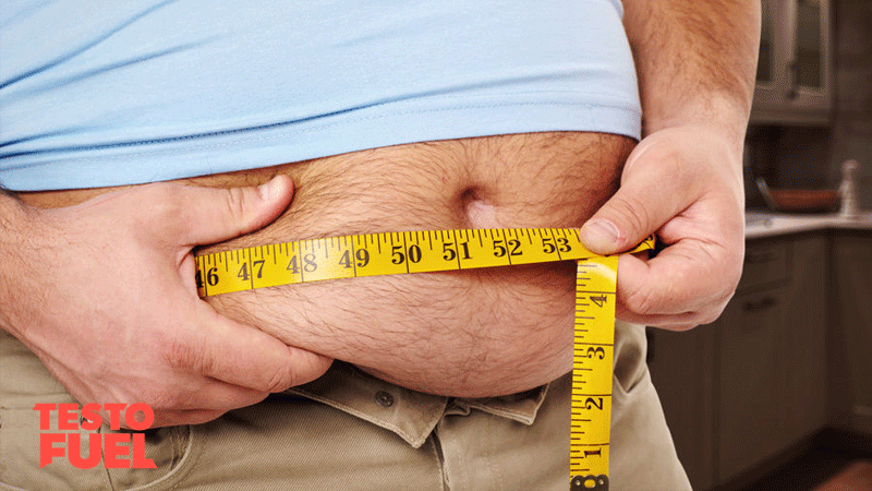 Obese man with a tape measure around his large waist