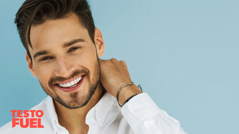 Male model man smiling on blue background