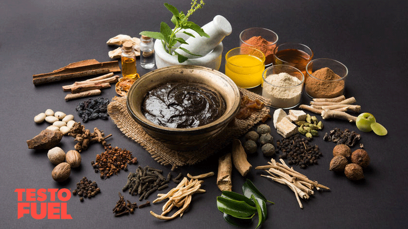 Close up of an Indian Ayurvedic dietary supplement called Chyawanprash / chyavanaprasha on dark grey background